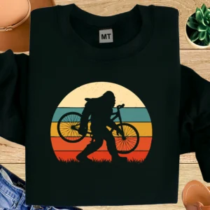Bigfoot Cycling T-Shirt | Retro Sunset Sasquatch Bicycle Graphic Tee