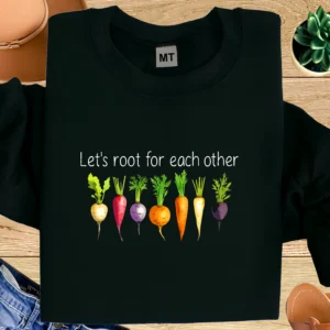 100% premium cotton “Let’s Root For Each Other” gardening T-shirt featuring colorful vegetables and a positive garden message.