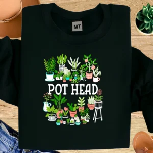 100% premium cotton. “Pot Head” funny plant lover T-shirt featuring a vibrant houseplant illustration. Soft, breathable fabric perfect for everyday wear.