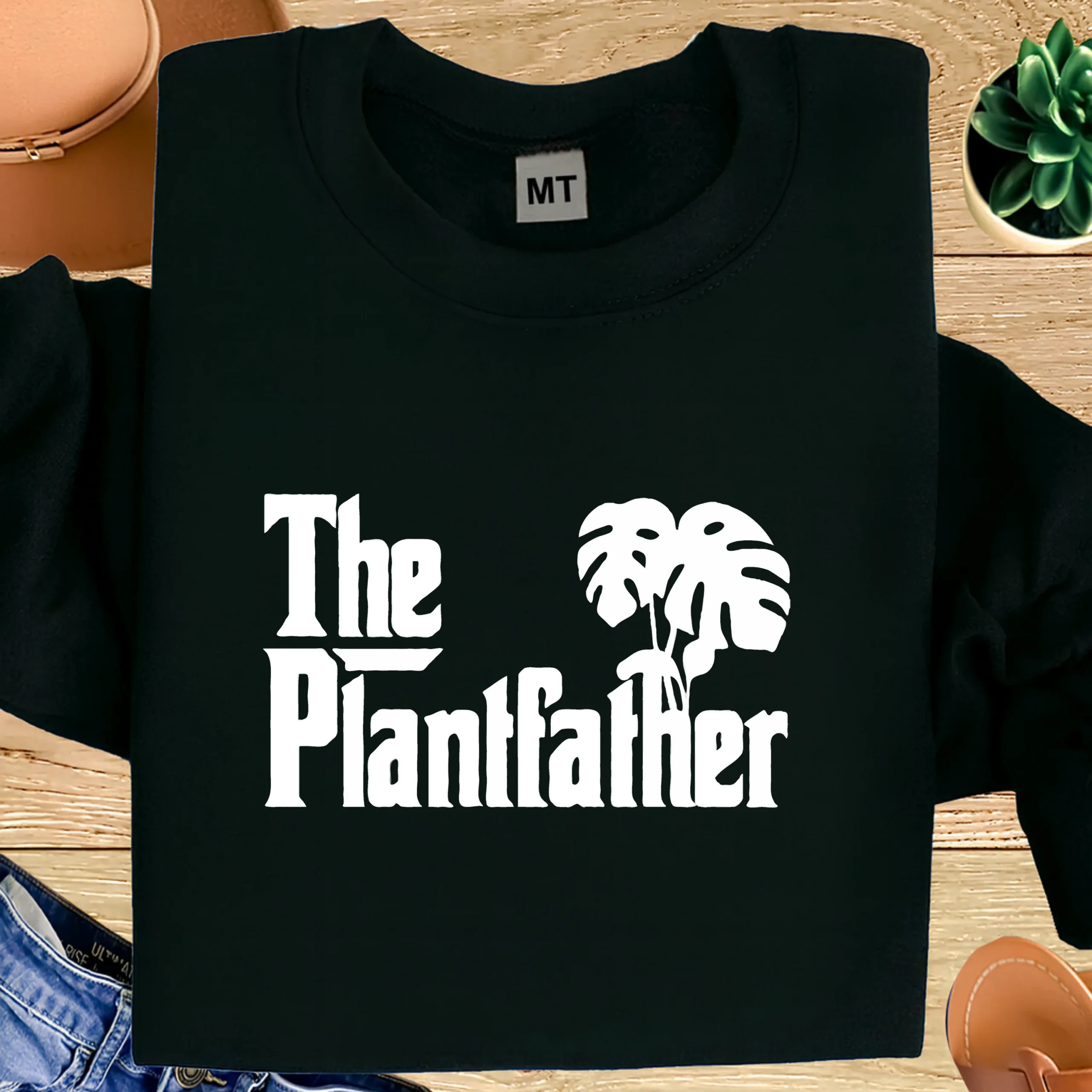 The Plantfather funny plant lover T-shirt made from premium cotton. Perfect gift for plant dads, gardeners, and indoor plant lovers.