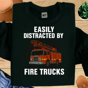 Funny “Easily Distracted By Fire Trucks” T-shirt featuring a bold fire truck graphic. Perfect for firefighters, fire truck lovers, and humor fans.