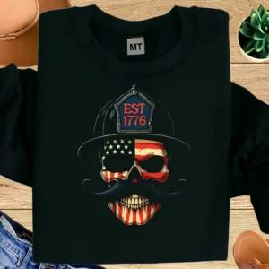 Bold firefighter skull T-shirt featuring EST 1776 design with American flag style. Perfect patriotic tee for firefighters and fire department pride.