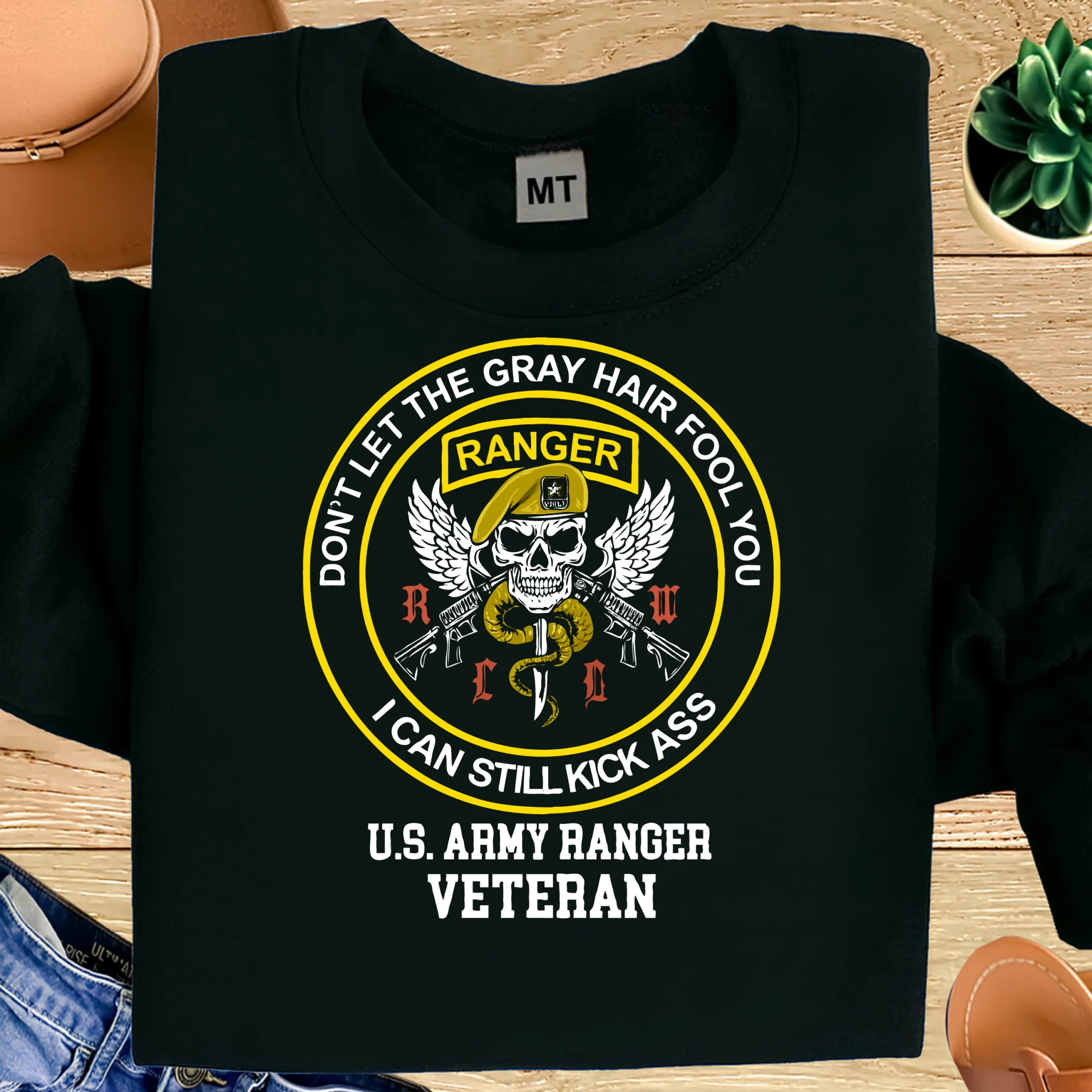 U.S. Army Ranger Veteran T-shirt with bold skull and ranger insignia. Premium cotton tee for tough veterans with humor, pride, and attitude.